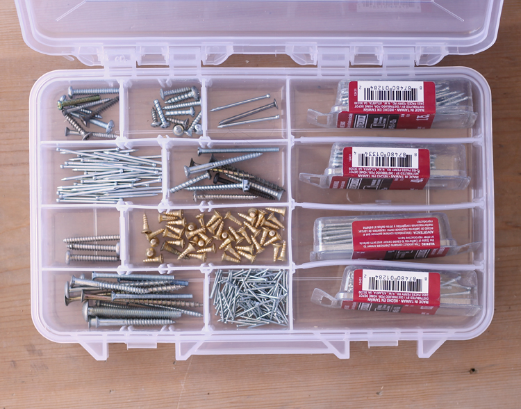 Use a divided craft tray to sort screws and nails in the garage.