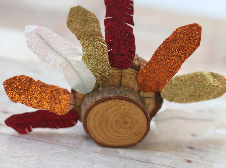 thanksgiving turkey craft made of wood slices