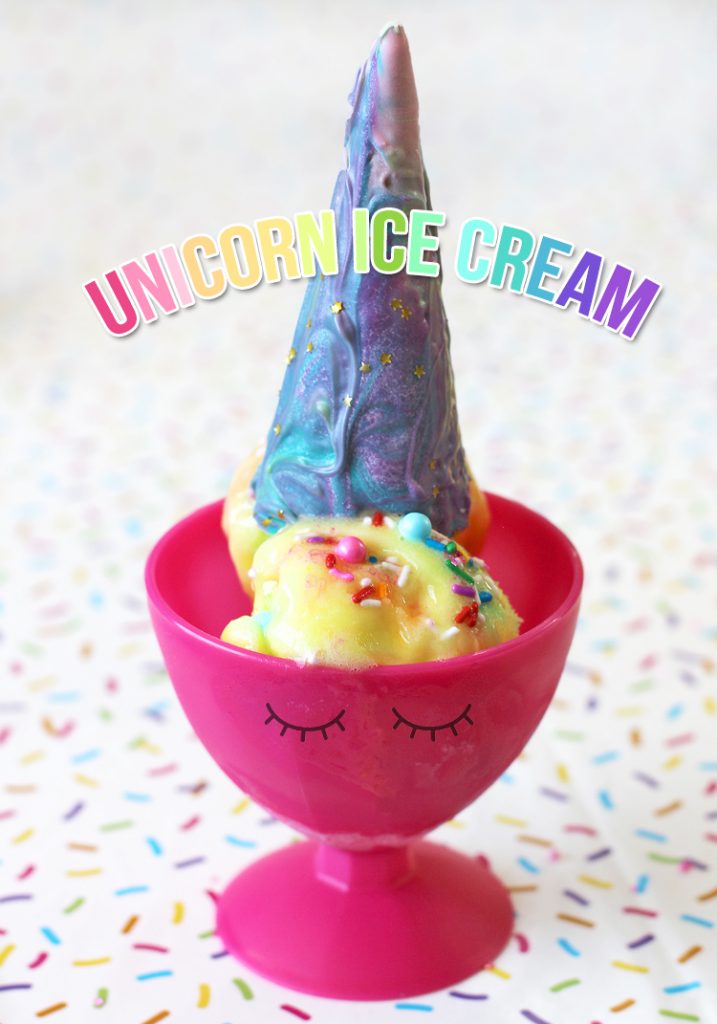 Colorful unicorn sugar cone horn in a cute ice cream dish