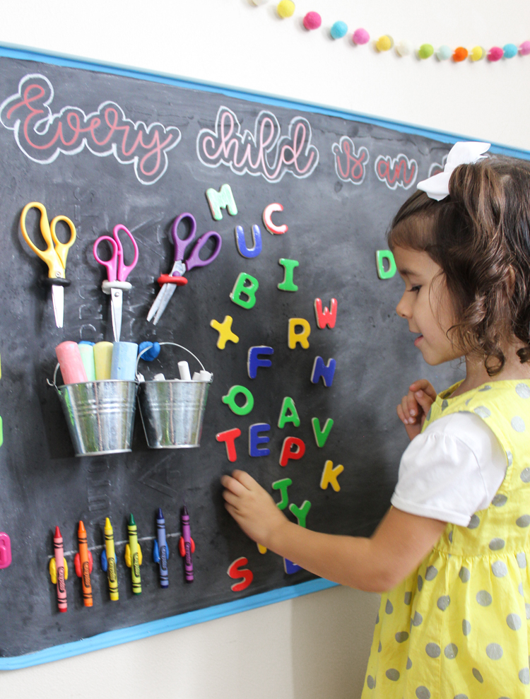 Make a magnetic chalkboard art station for your little artist.