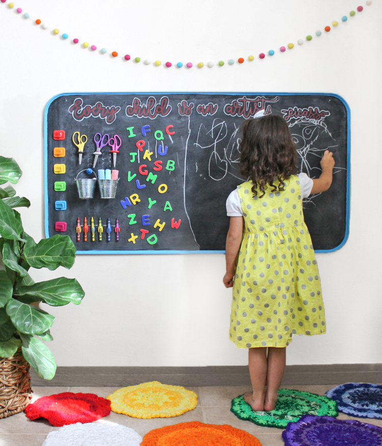 Create a giant magnetic chalkboard art station for children with the help of Sugru mouldable glue.