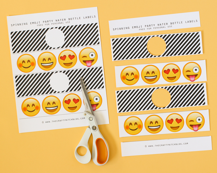 These emoji themed party drink labels spin around to reveal different emoji faces!
