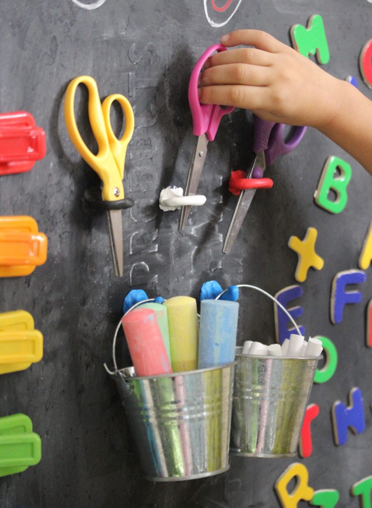 Unique hanging art station for kids that you can make!