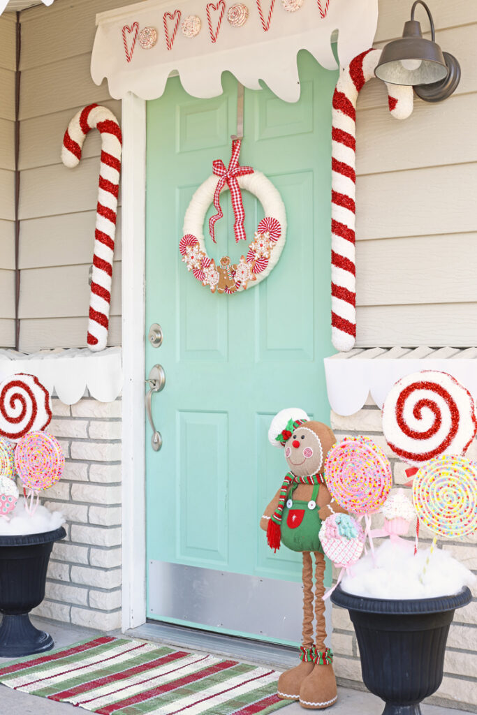 christmas porch decorated to look like a gingerbread house
