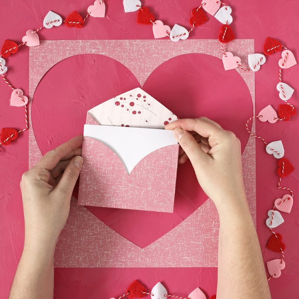 how to make a paper heart into an envelope