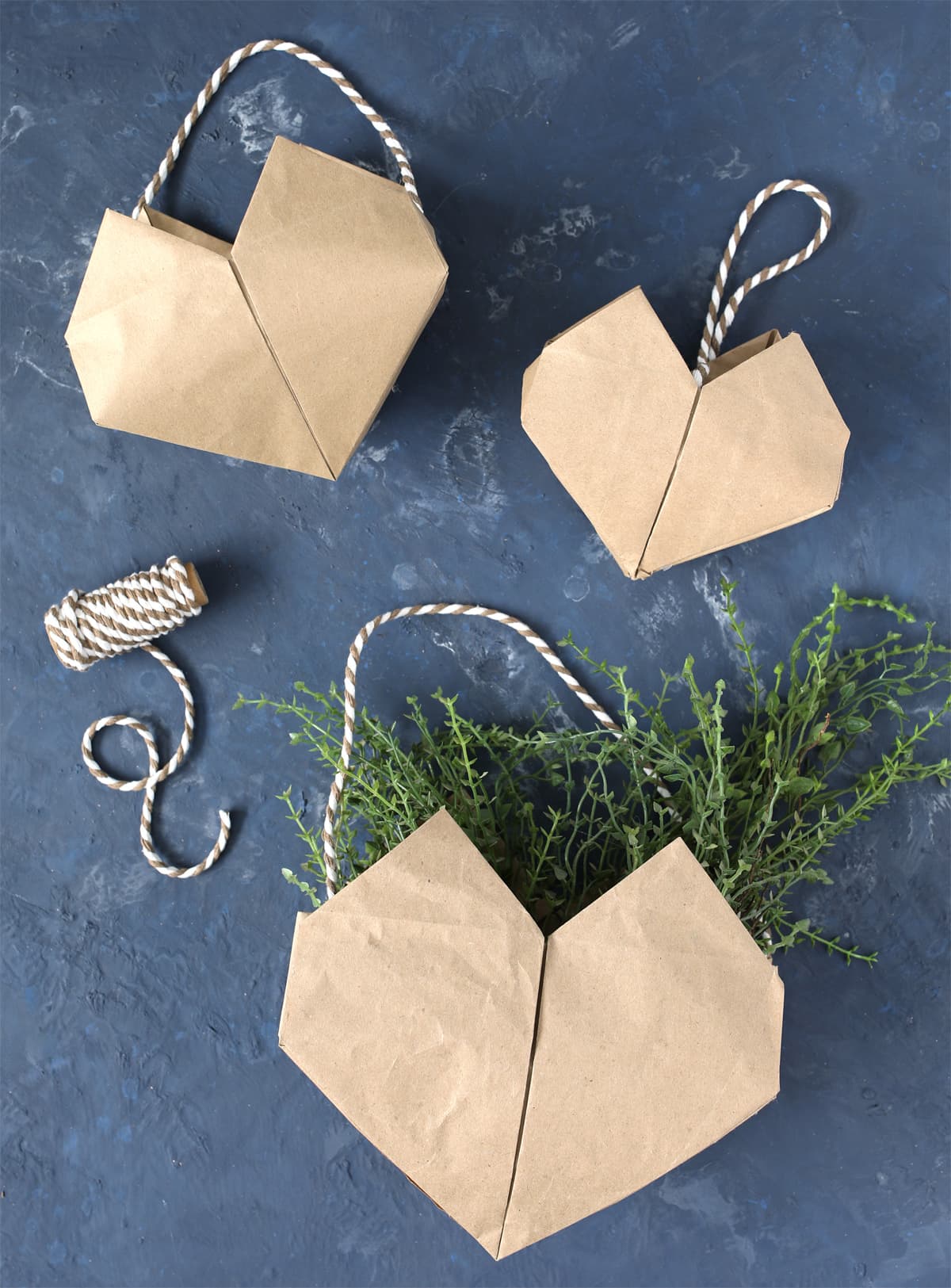 how to make folded paper heart baskets