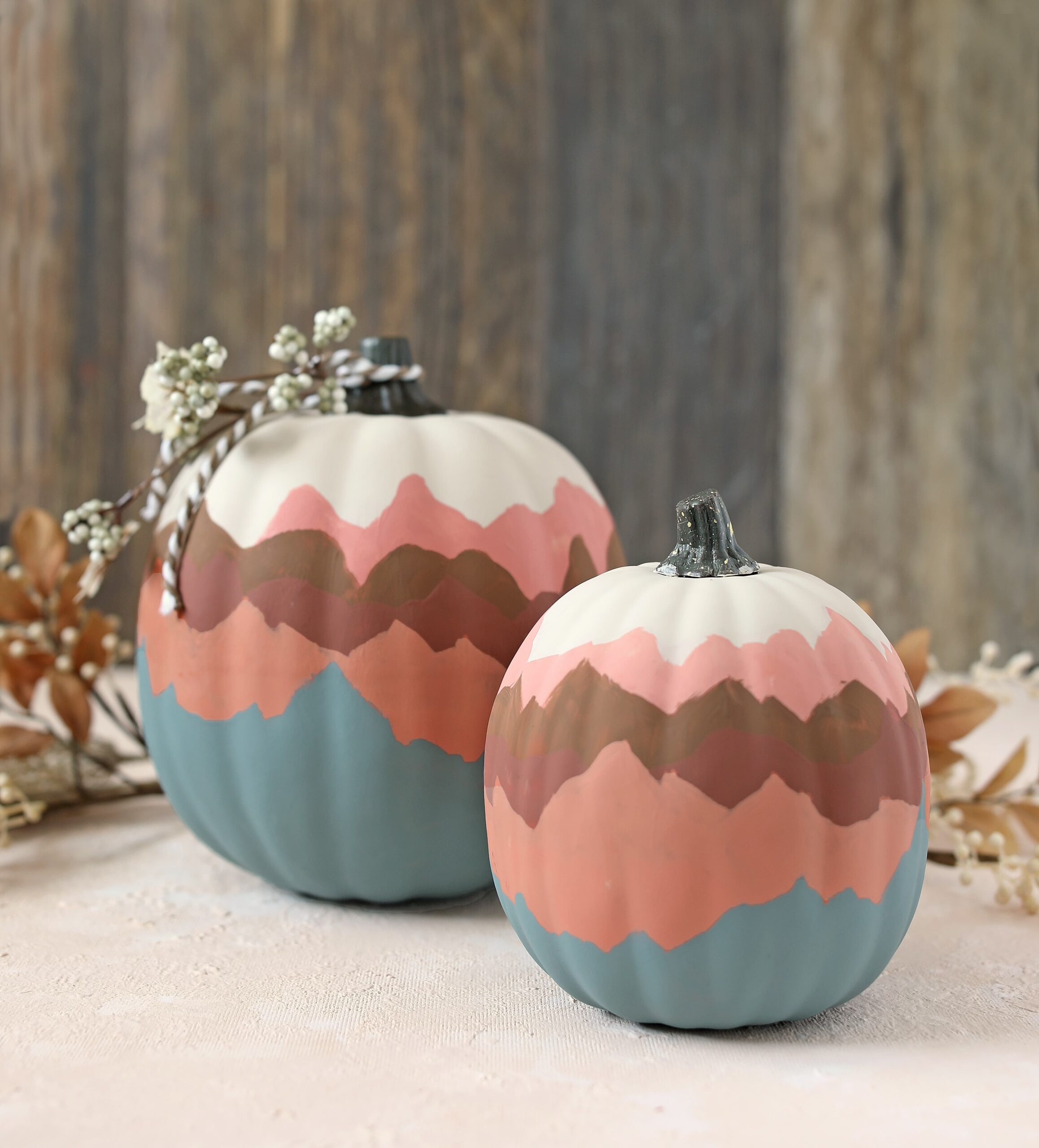 mountains painted on pumpkins